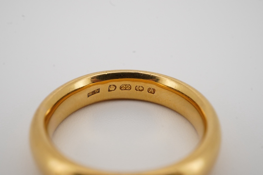 A George V 22ct gold wedding band, hallmarked for Birmingham, 1925, size M, 9 grams. Condition - good